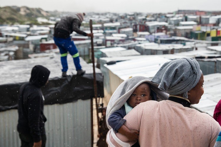 A flooded route changing daily access in Cape Town